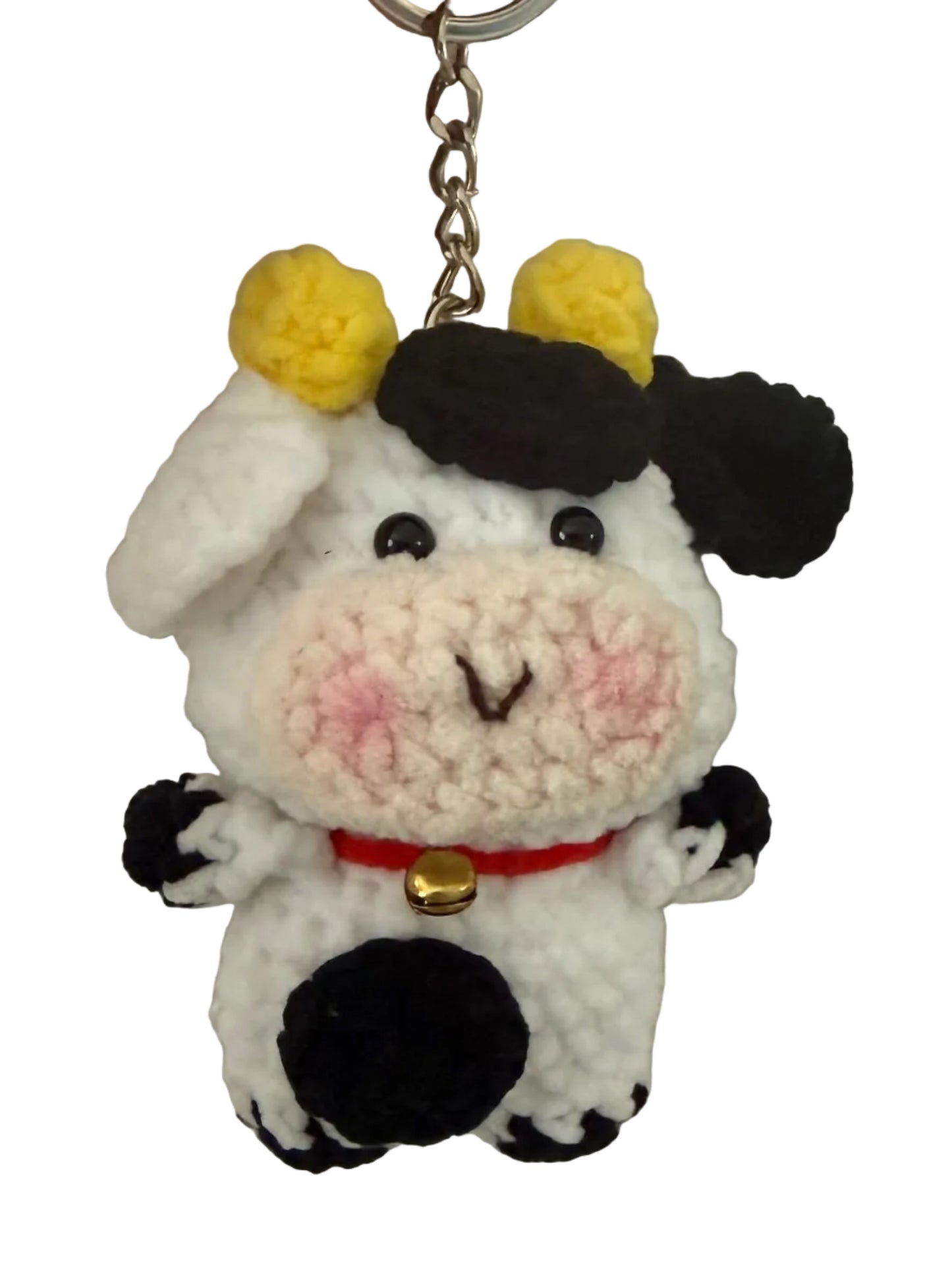 Black and White Cow with Bells